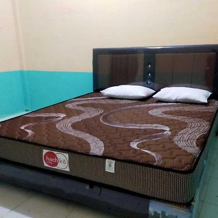 Express O 91938 Grace Kost & Hostel Tiga Binanga Dış mekan fotoğraf
